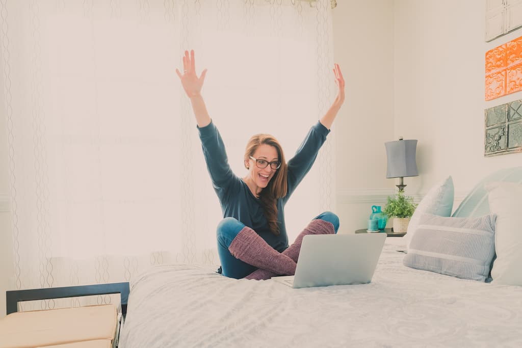 happy women doing her tax return online