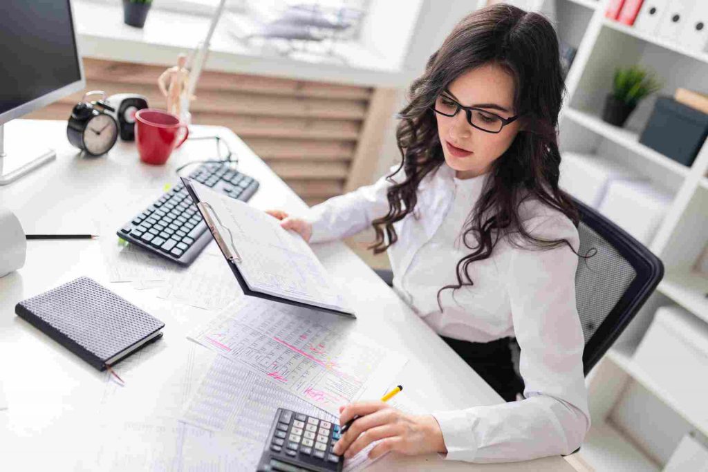 girl is sitting at the office desk